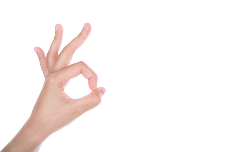 Person making an okay sign with their hand