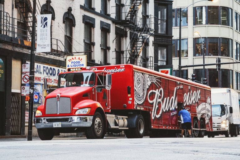 Budweiser truck parked on a road