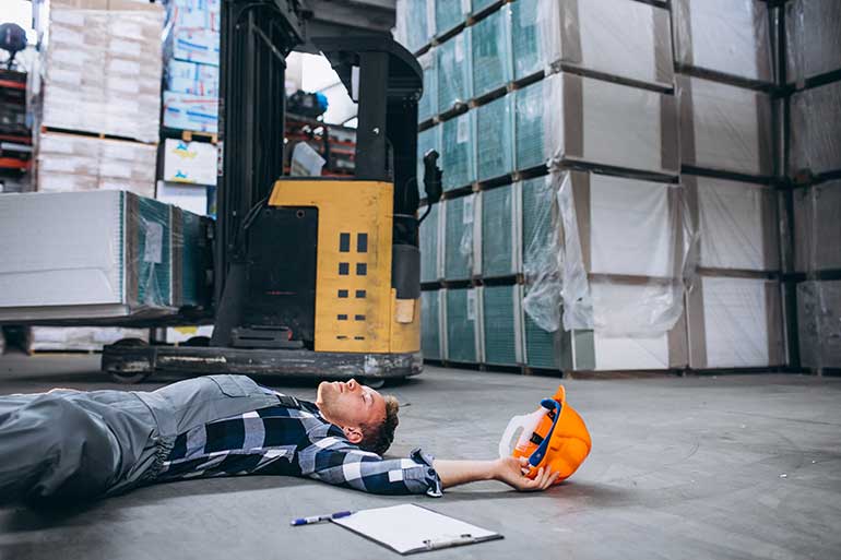 Worker on the floor after a fall
