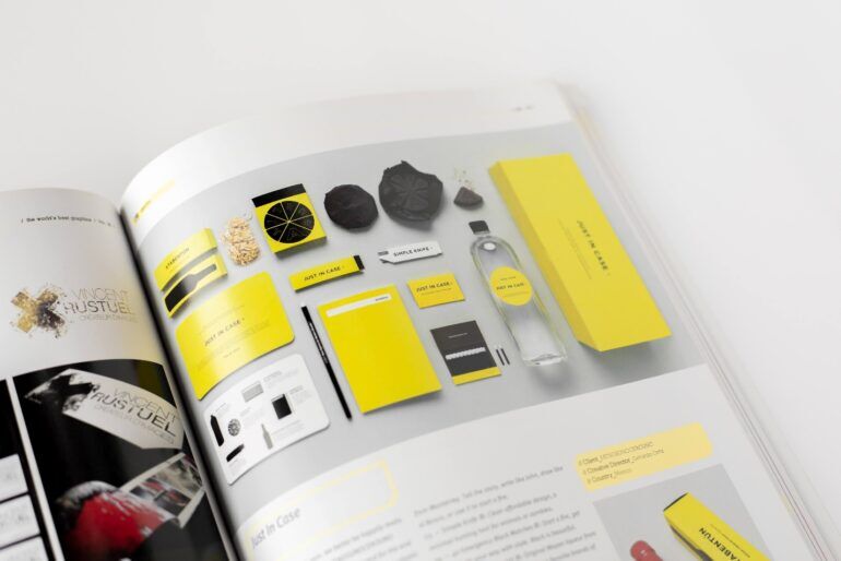 Print magazine showing a colorful yellow advert