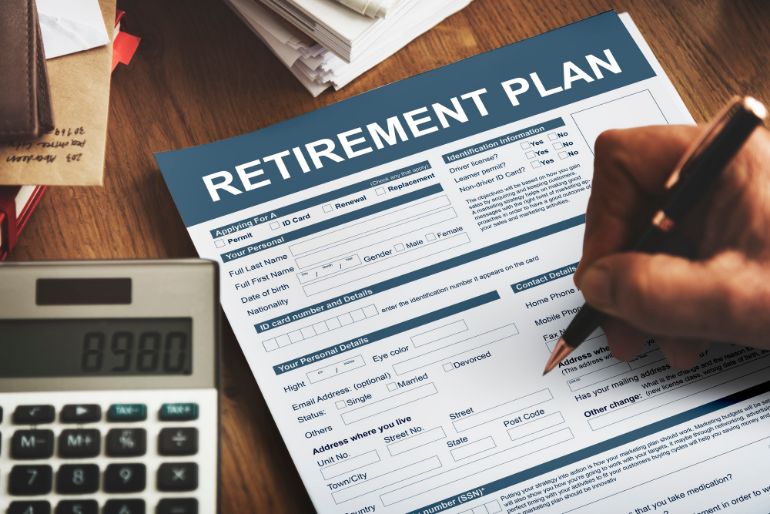 Person filling out a retirement plan form
