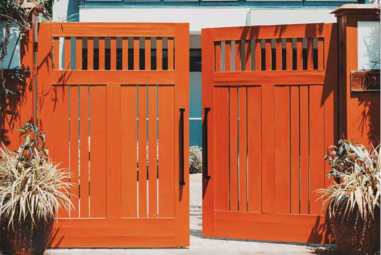 Orange double driveway gates